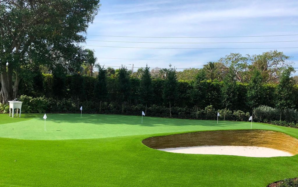 Backyard putting green with stacked turf